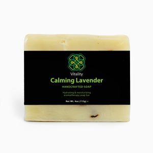 Lavender Bliss Soap Bar with dried lavender flowers.